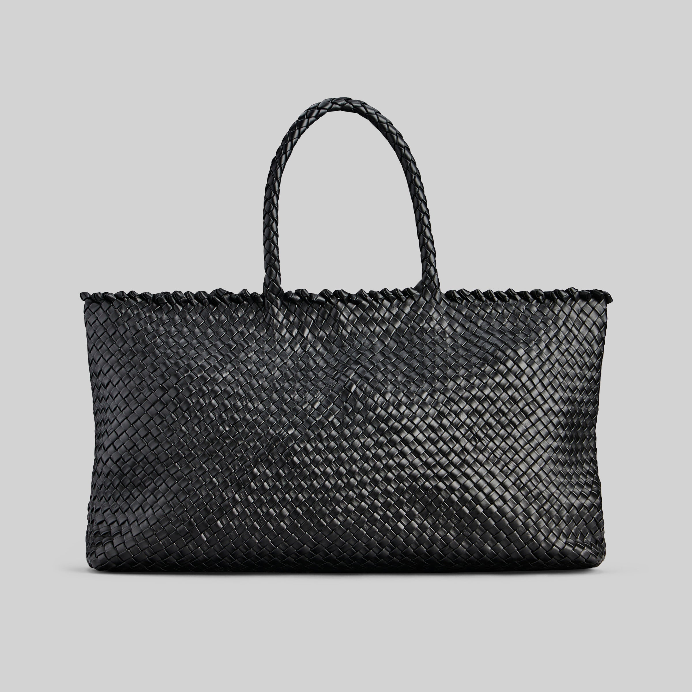 Ribichini Woodstock weekend-vesken i sort, håndlaget med fletting og solide håndtak.