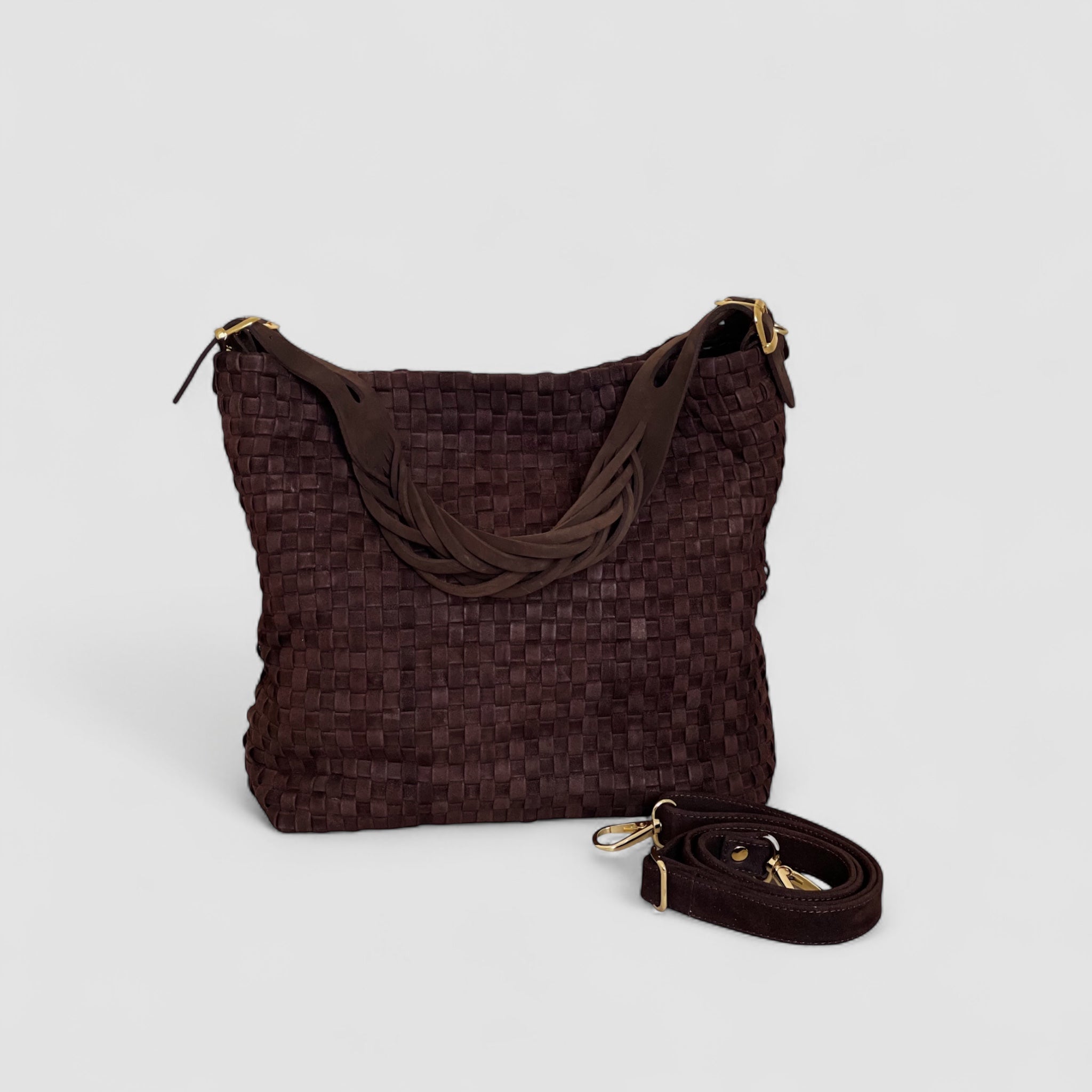 Med matchende chocolate skulderstropp kan du bære Ribichini Camper-vesken enkelt over skulderen.