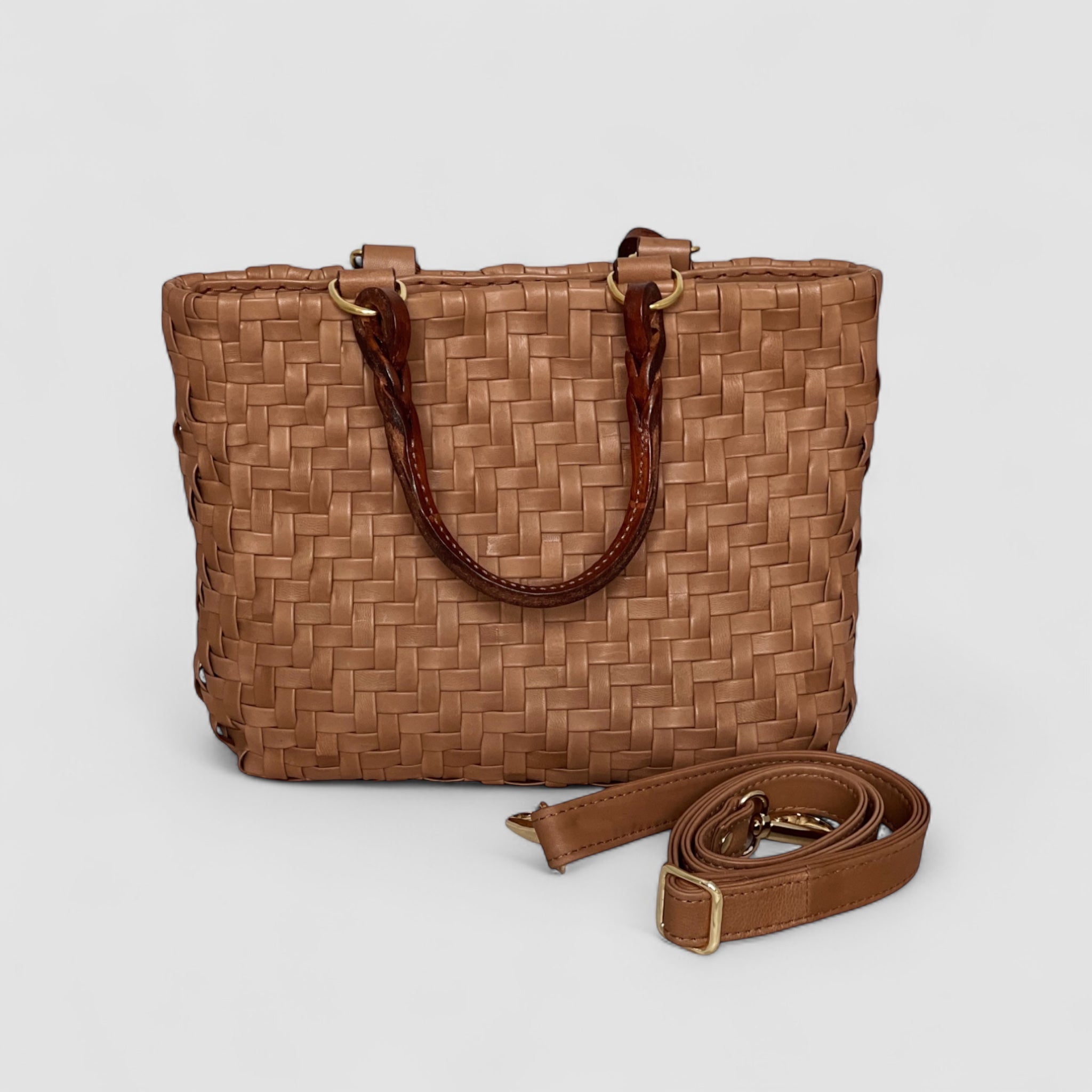 Bildet viser den avtagbare skulderstroppen på en Ribichini Safari Lady-veske i cognac. Fleksibel og elegant bærekomfort.