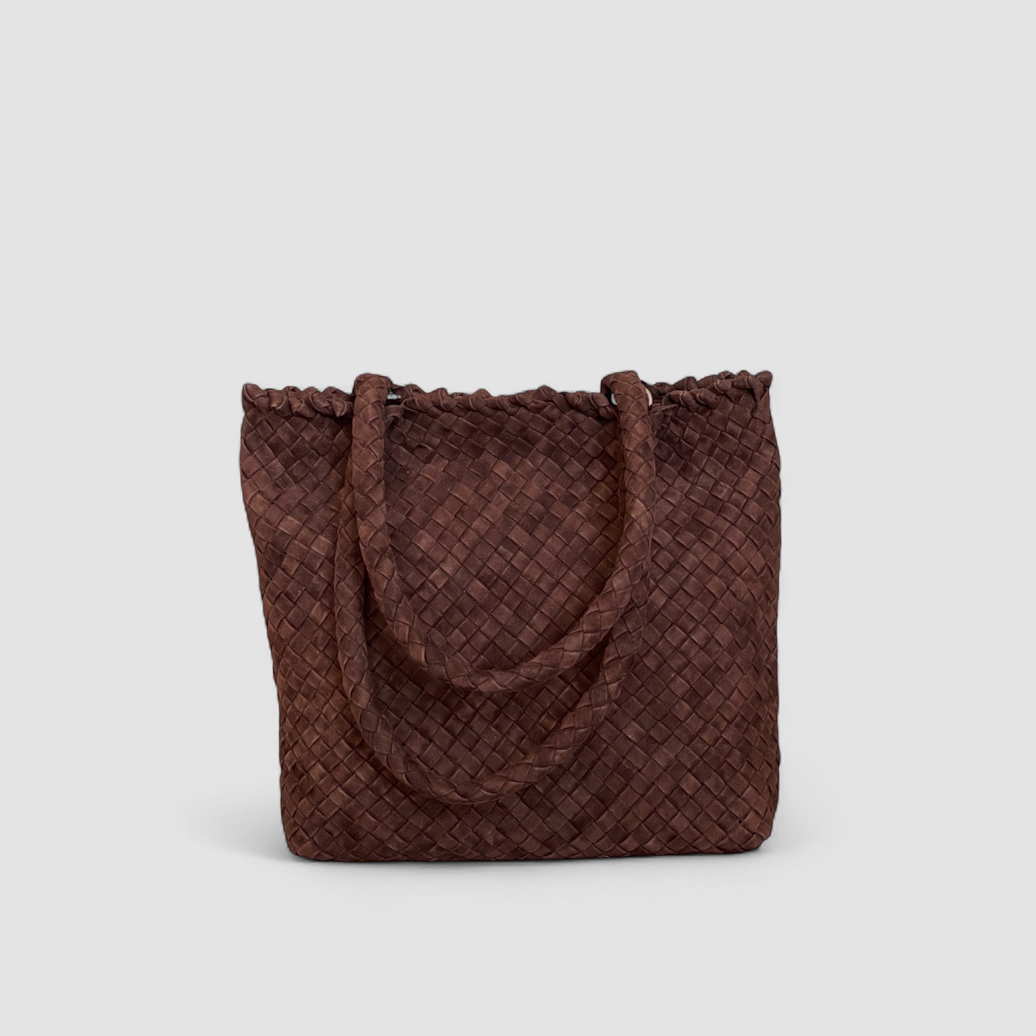 En eksklusiv Ribichini Woodstock Royal Babe-veske i sjokoladefarge, laget av flettet semsket lammeskinn.