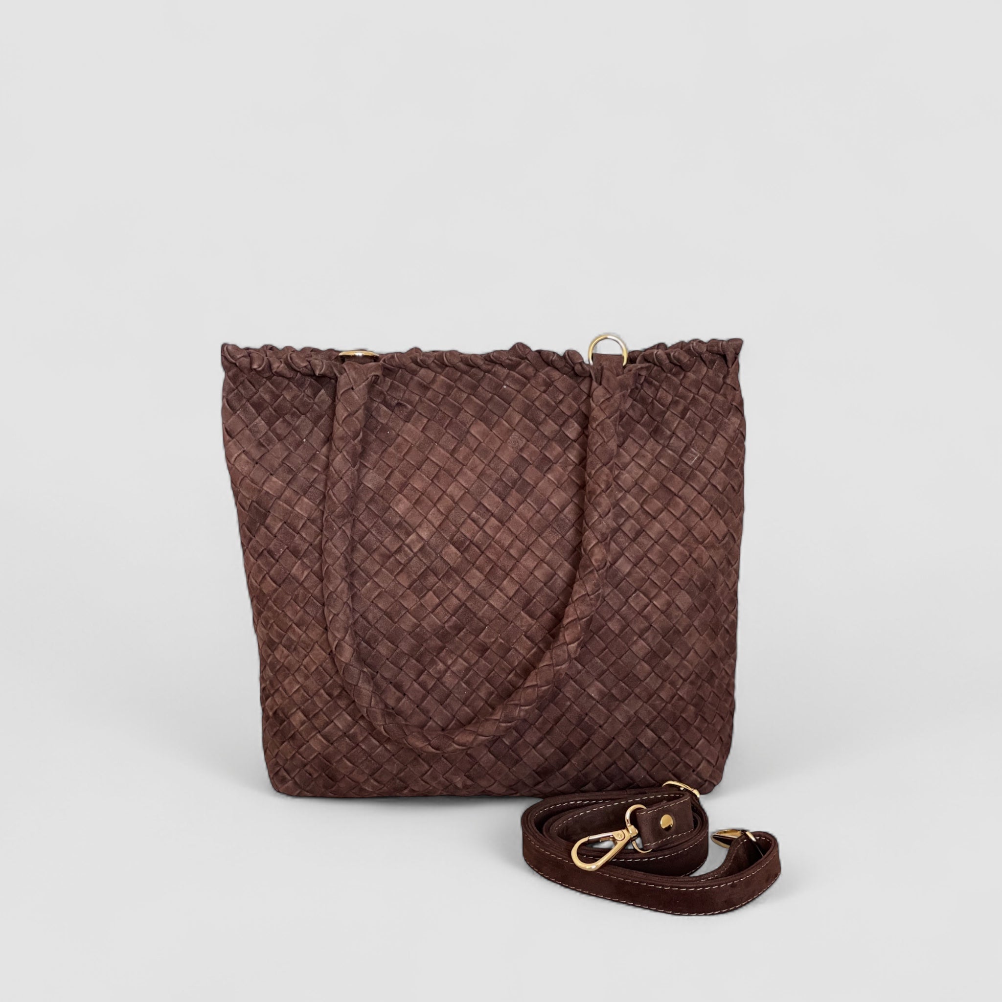 Ribichini Woodstock Royal Babe veske i sjokoladefarge har en avtagbar skulderstropp for allsidig bruk.