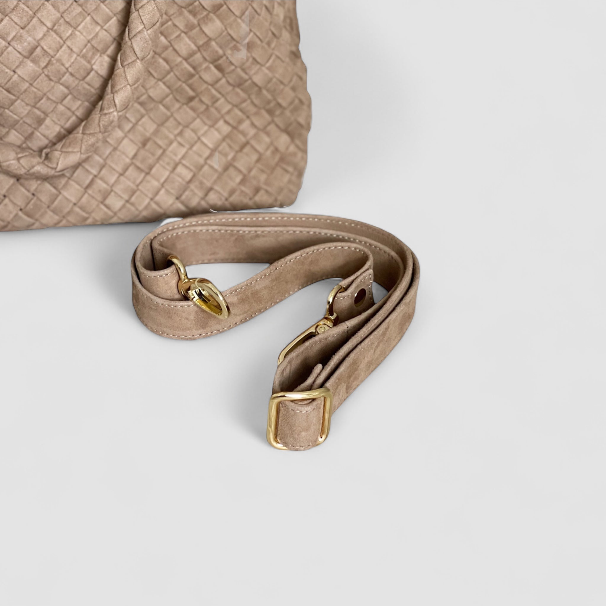 Ribichini Woodstock Royal Babe veske i terra har avtagbar skulderstropp for fleksibel bærestil.