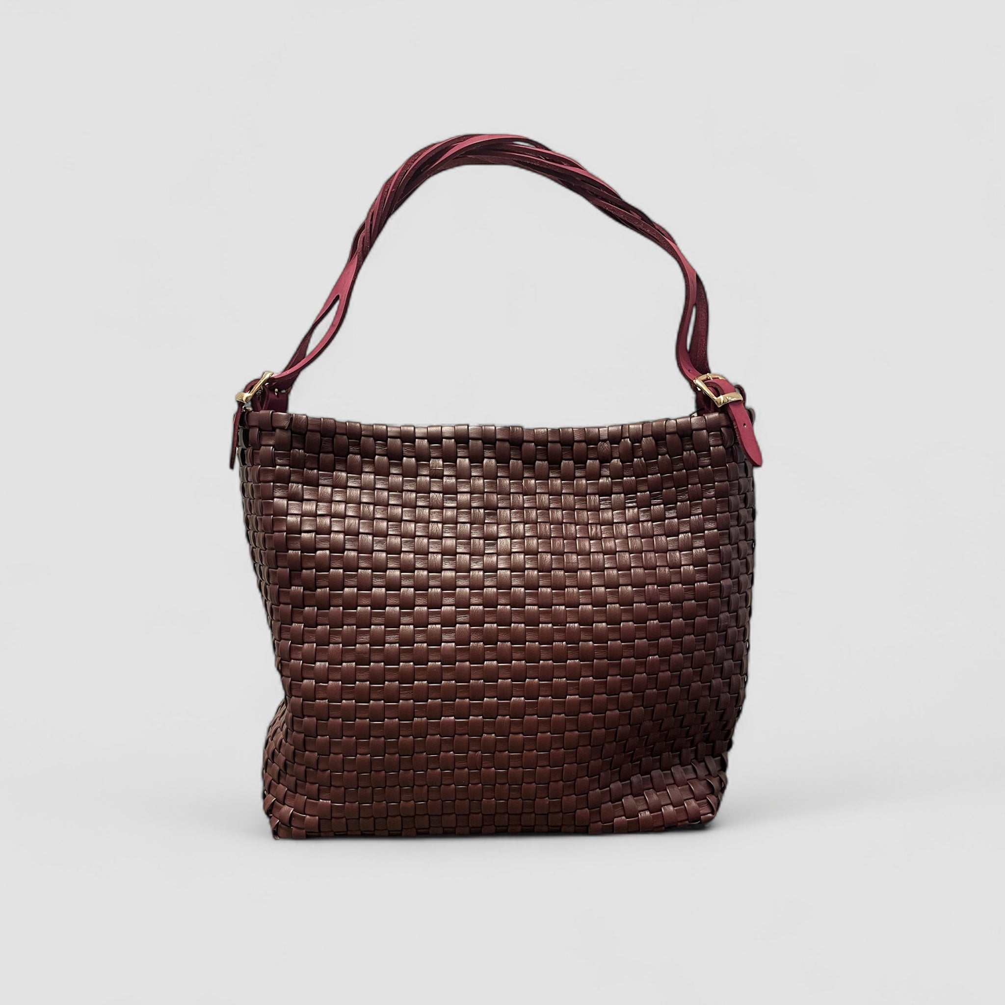 Ribichini Camper Clean veske i bordeaux glatt flettet lammeskinn med matchende hank og gylne detaljer.