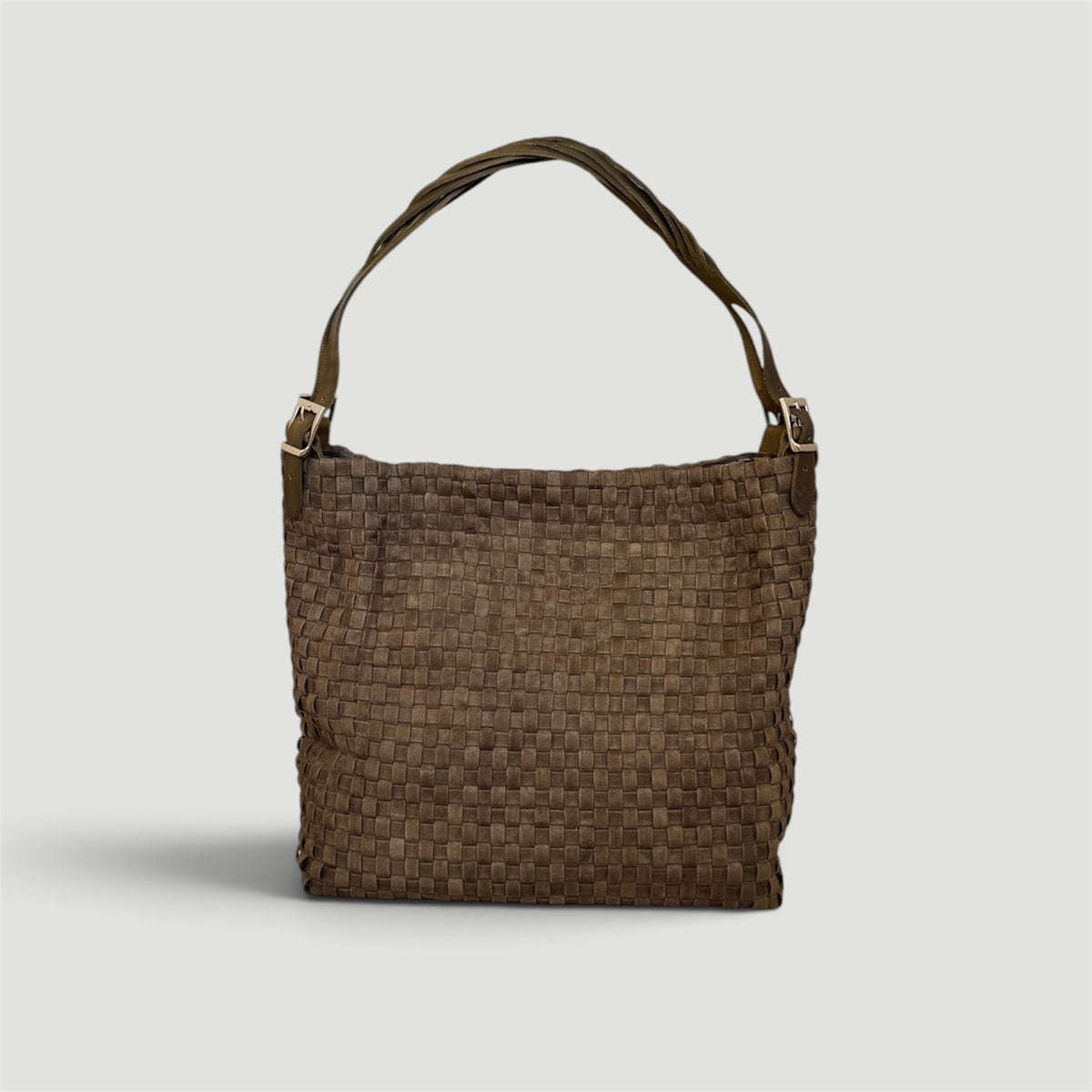 Ribichini Camper Suede Olive – håndflettet skulderveske i olivengrønt semsket lammeskinn med flettede skulderremmer.
