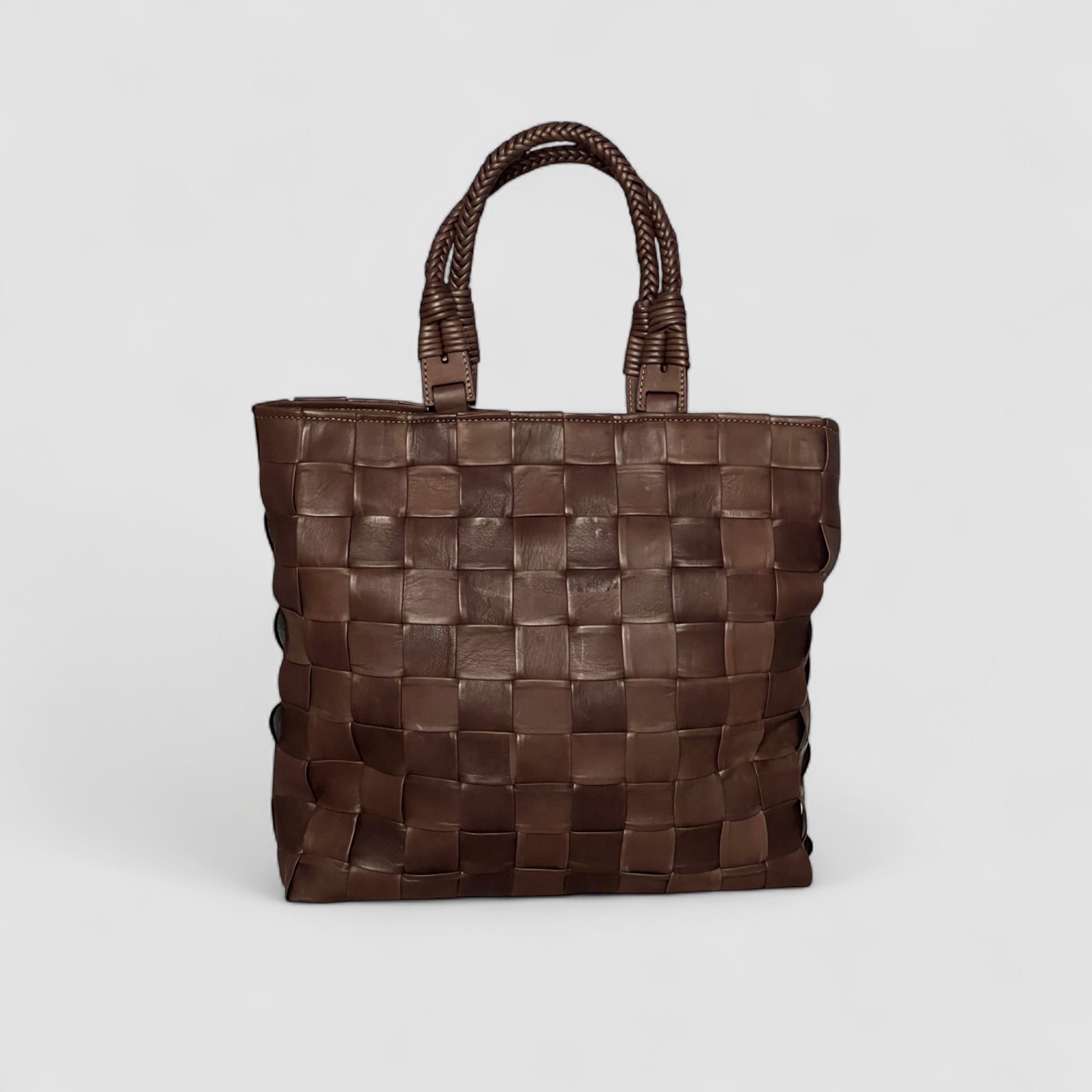 Eksklusiv Ribichini Square brun skinnveske med flettet design.