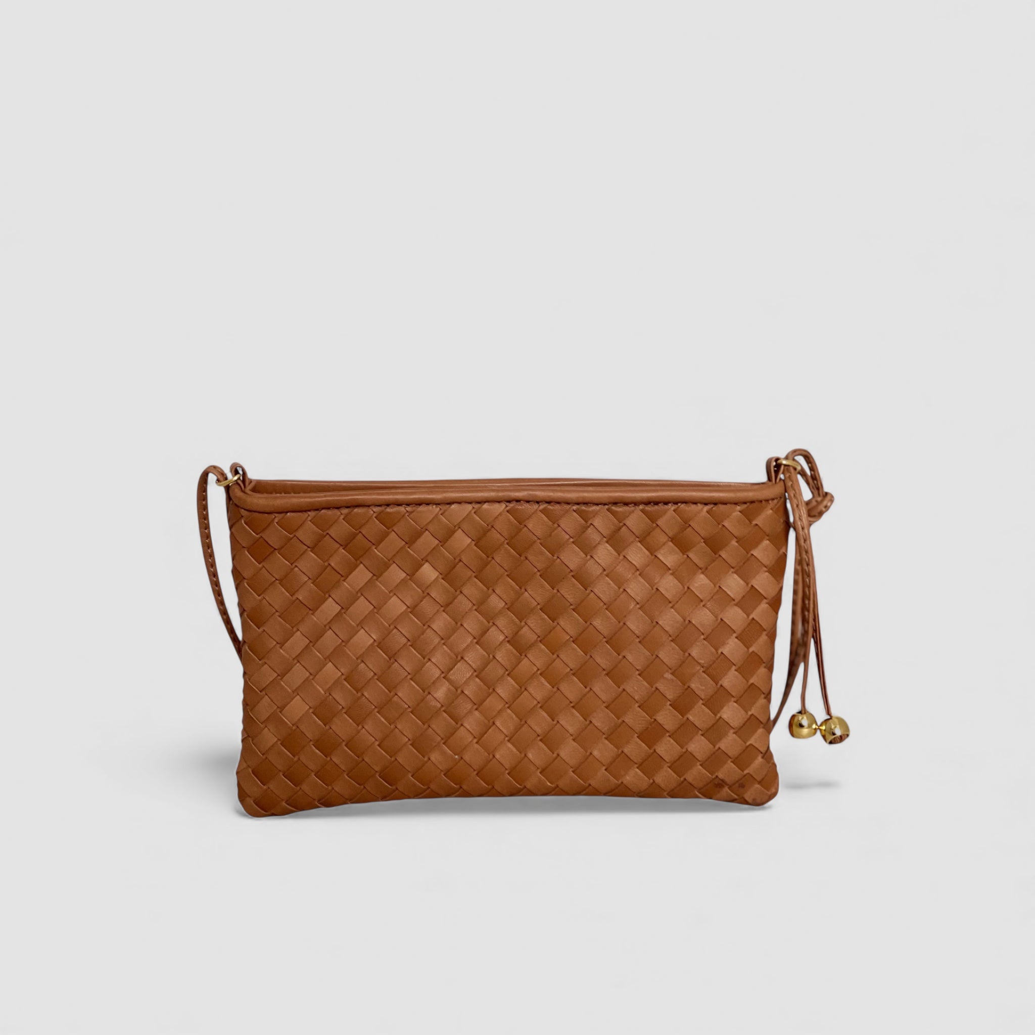 Ribichini Camper Clean Clutch i cognacfarget flettet lammeskinn.