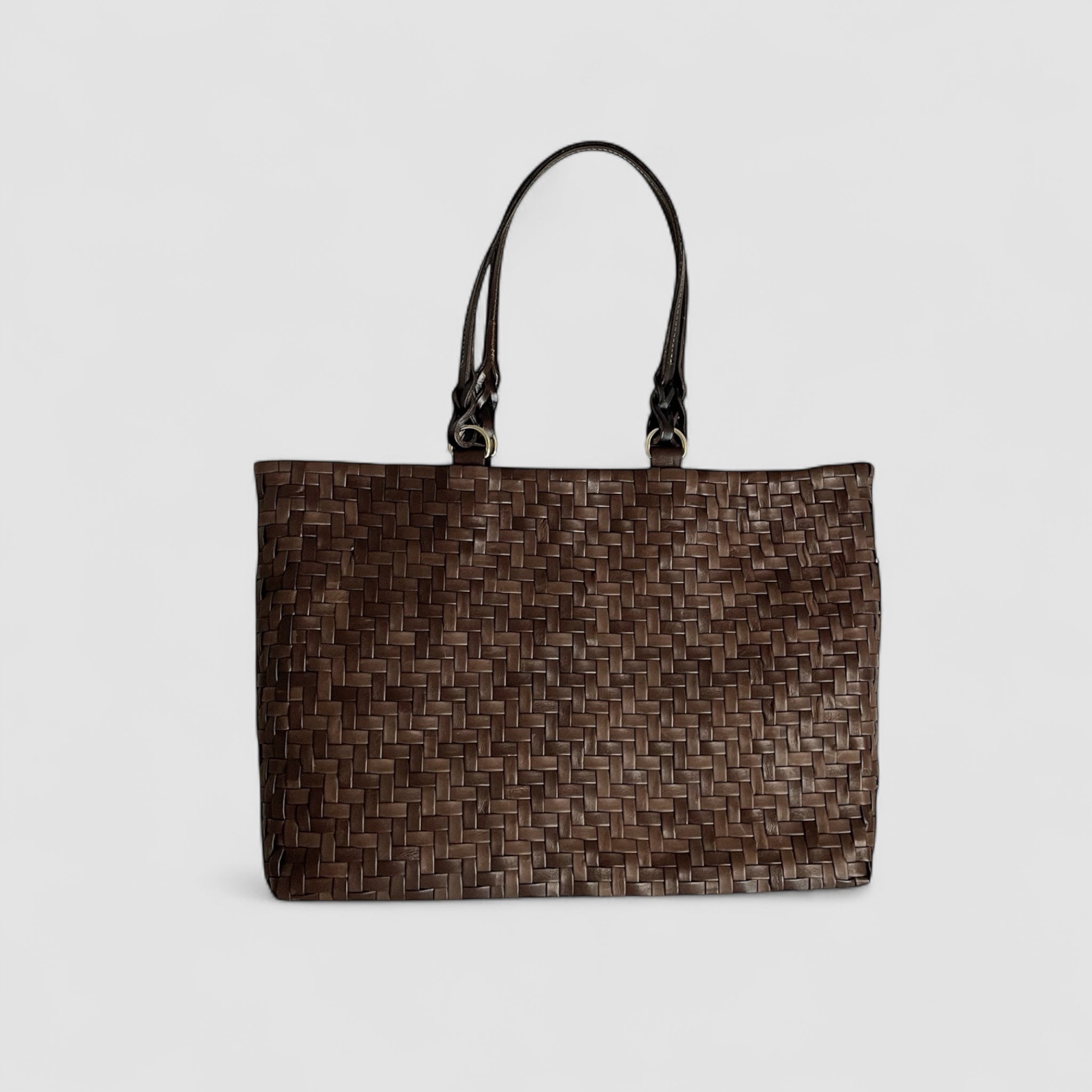 Ribichini Safari i brunt lammeskinn er en stilig veske med flettet fiskebensmønster.